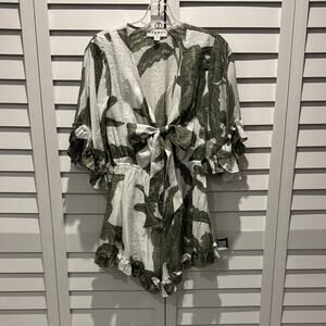 BigHit Fashion Tropical cut Out Ruffles Romper with front Tie.
